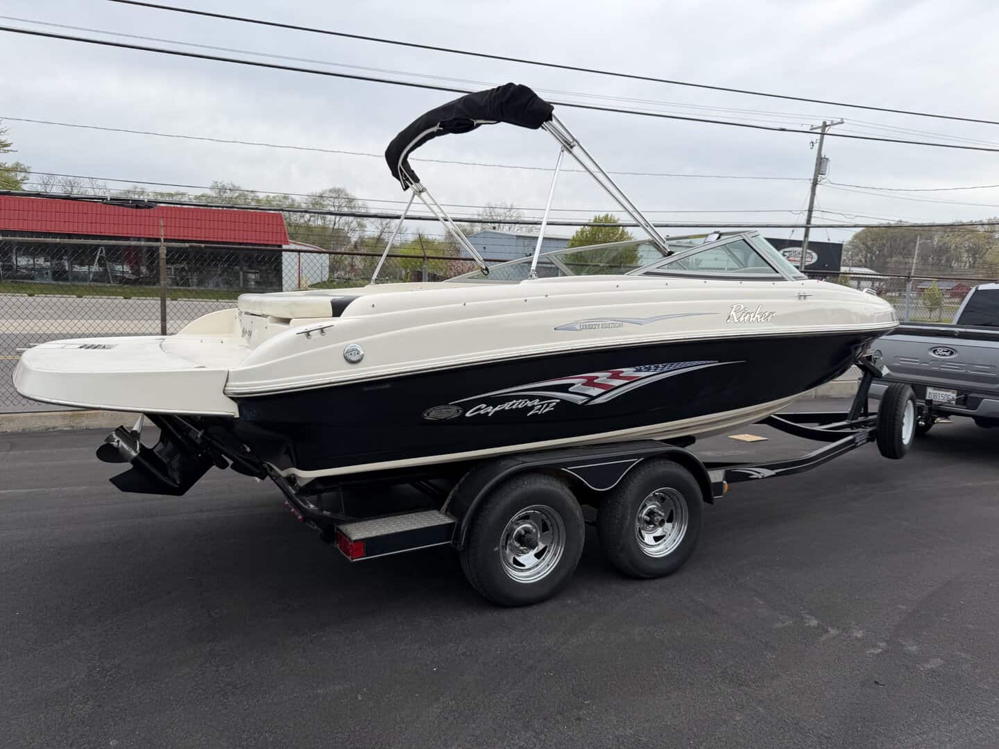Speedboat on trailer for water sports and boat rentals at Hall's Sport Center.